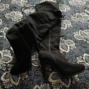 Black thigh high boots